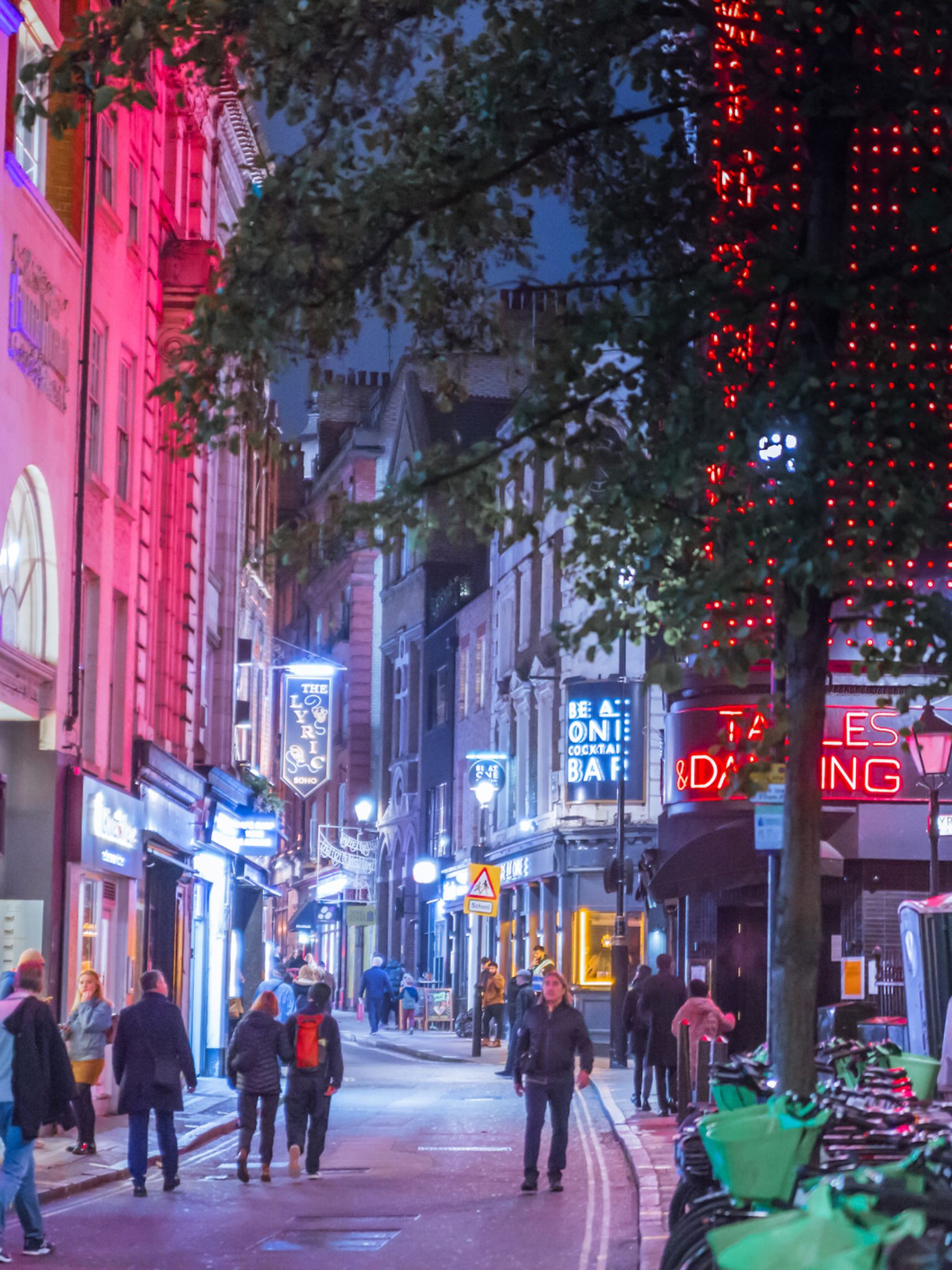 London, UK - 8 November, 2024: Spirit of Christmas, Soho West ends Christmas lights, London illuminated for 2025. Crowd on streets, people enjoying festive atmosphere