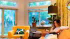 Woman reading at home on a rainy day