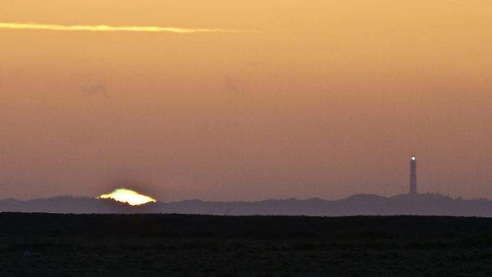 Sonnenuntergang mit grünem Blitz auf Amrun. | Verwendung weltweit