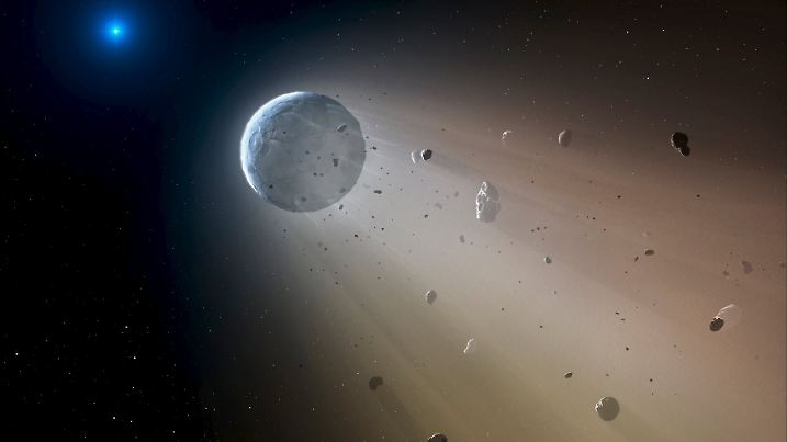 A Ceres-like asteroid is pictured slowly disintegrating as it orbits a white dwarf star in this undated handout artist's rendering in this undated handout photo obtained by Reuters October 22, 2015. Astronomers have spotted telltales signs of such an object using data from the Kepler K2 mission. It is the first planetary object detected transiting a white dwarf. Within about a million years the object will be destroyed, leaving a thin dusting of metals on the surface of the white dwarf.  REUTERS/Mark A. Garlick/Harvard-Smithsonian Center for Astrophysics/Handout via Reuters    ATTENTION EDITORS - THIS PICTURE WAS PROVIDED BY A THIRD PARTY. REUTERS IS UNABLE TO INDEPENDENTLY VERIFY THE AUTHENTICITY, CONTENT, LOCATION OR DATE OF THIS IMAGE. EDITORIAL USE ONLY. NOT FOR SALE FOR MARKETING OR ADVERTISING CAMPAIGNS. NO RESALES. NO ARCHIVE. THIS PICTURE IS DISTRIBUTED EXACTLY AS RECEIVED BY REUTERS, AS A SERVICE TO CLIENTS